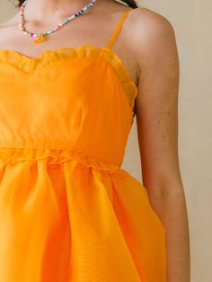 We are obsessed with the Clementine Organza Mini Dress!! Bengals season—but make it fashion! This puffy dress is so SO cute and sure to make you a stand out in any room! You will rock this! 100% Polyester