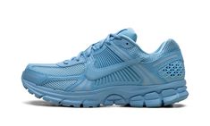 The Nike Zoom Vomero 5 "University Blue" is a monochromatic blue colorway of the retro running shoe.  Debuted in 2010, the Zoom Vomero 5 was re-introduced as a lifestyle shoe via a collaboration with Samuel Ross’s *A COLD WALL clothing brand in 2018, and again beginning in 2022.  Here, the “University Blue” finishes the shoe with an all-blue design.  The upper features a University Blue mesh construction with tonal overlays throughout.  A University Blue leather Swoosh appears on both sides of t Monochromatic Blue, Samuel Ross, Nike Zoom Vomero 5, Nike Vomero, Zoom Vomero 5, Retro Running Shoes, Vomero 5, A Cold Wall, Shoe Nike