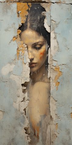 an image of a woman's face is seen through the torn up paint on a wall