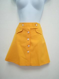 JO SKIRT Handmade skirt 100% Polyester Color: yellow You can choose your own measurements, color or length. You can choose lining, or other special request. Special request are easy, just add this listing to your cart https://www.etsy.com/listing/624364219/special-requests?ref=shop_home_active_25 If you want it on a rush you have priority shipping here, just add the one suits you the best to your cart https://www.etsy.com/shop/swingingchicksshop/items?ref=pagination&section_id=24952619 If yo 1960s Mini Skirt, 60s Skirt, Librarian Chic, Handmade Skirts, Retro Skirt, Yellow Skirt, 1960s Fashion, 60s Fashion, Womens Skirts