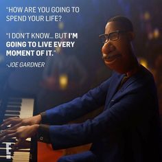 a man sitting at a piano with a quote about how to spend your life?