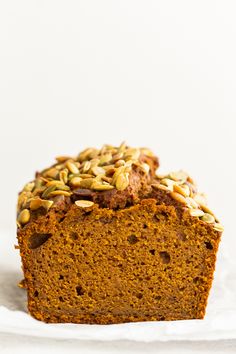 a loaf of pumpkin bread sitting on top of a white napkin