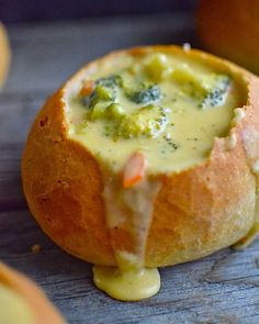 broccoli and cheese soup in a bread bowl