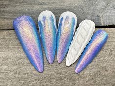 Dawn Witch Designs Unique, re-usable, hand painted, and made in Canada. These luxury press on nails are handmade using high quality gel polish and salon-grade materials.  ✨ FROSTED SEASON ✨  This set has a beautiful blue shimmer with 3D icicles and a 3D sweater nail as an accent. It's the perfect set for the winter season! *The shape shown in the pictures is the MEDIUM ALMOND *Colours may appear a little different due to your personal monitor settings* ✨ BUY 3 GET 1 PROMOTION ✨  ➜ Buy 3 sets of Cold Nail Designs, Almond Nail Art Christmas, Iridescent Snowflake Nails, Navy Sweater Nails, Blue Sweater Nail Designs, December Nails Stilleto, Blue Winter Nail Designs Short, Blue Christmas Nails Designs, Jack Frost Nails