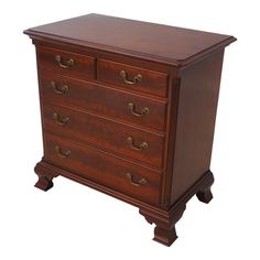 a wooden dresser with three drawers on one side and two pulls on the other end