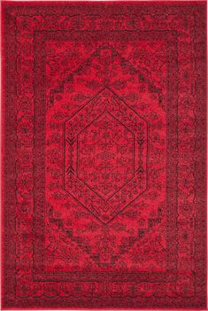 a red rug with an intricate design on the center and sides, in different colors