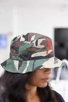 With unique designs you won't find anywhere else, our caps are the quality type that are designed with a thicker woven fabric. Not those flimsy weak ones that lose shape. 100% stitched embroidered design. Gatsby cap. Straight brim. Dry clean only. Perfect for those Devastating Divas who needs head/face protection from the sun, sweat and elements while out doing fitness, events or anything fun. Face Protection, Embroidered Design, Gatsby, Woven Fabric, Camouflage, Diva, Bucket Hat, Unique Designs, Hats