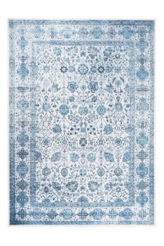 a blue and white rug with an intricate design