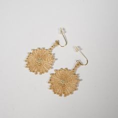 Product Description : Why is it so EXPENSIVE? Product Story General Product Information High quality gold and silver threads are used which is made by a group of skilled gold and silver thread craftsmen who have made full use of their skills.These earrings are finished with an embroidery technique that is unique to supple threads. The finish keeps light weight even with the impactful quality of gold and silver, and adds gorgeous color to your ears.According to Feng Shui, the gold color not only Traditional Gold Flower Earrings With Ear Wire, Gold Flower Earrings With Intricate Design For Gift, Gold Flower Earrings With Intricate Design As Gift, Craft Markets, Daily Necessities, Japanese Paper, Gold Threads, Embroidery Techniques, Silver Foil