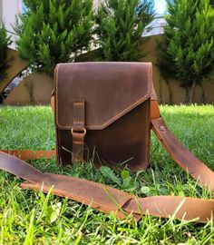 The craftswomen of our company combine old craftsmanship with modern function. Light brown leather bag made of full grain leather. This leather bag has a timeless design. Our products are made from 100% full grain leather and 100% handwork. The product in the picture is the "BERLIN XS" model with a magnetic lid closure. The dimensions in the picture of BERLIN XS are 18*20*7' The high quality and unique design make them stand out from the crowd. It's time to get a DIFFERENT style handbag With the Leather Bag Handmade, Handmade Leather Bag, Light Brown Leather, Brown Leather Bag, Leather Bags Handmade, Genuine Leather Bags, Bag Handmade, Handmade Leather, Cowhide Leather