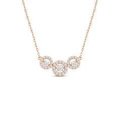 This is that necklace that shines during the day and well into the night. With a classic sparkle, this piece can be worn with any outfit, on any occasion. The necklace features a dainty chain securing a sparkling pendant composed of three concentric rings in a horizontal layout. Each circular outline is traced with diamonds and punctuated at the center with a dancing diamond that flashes a captivating twinkle at even the slightest movement. Dancing Diamond, Halo Necklace, Gorgeous Engagement Ring, Dainty Chain, Into The Night, Now And Forever, Love Symbols, Conflict Free Diamonds, Three Stone