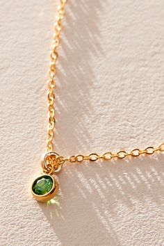 Add something personal to your stack with this beautiful necklace, featuring a 14k gold filled chain and dainty cubic zirconia birthstone charm. **Features:** 14k gold filled chain, 14k gold filled 3mm bezel, dangling cubic zirconia birthstone charm, spring ring clasp closure, 16" **Why We ❤ It:** One for you, one for your bestie, and one for everyone else you know-this necklace is perfect for gifting. | Set & Stones Birthstone Charm Necklace at Free People in Gold Birthstone Charm Necklace, Family Birthstone Necklace, May Birthstone, Birthstone Charms, Beautiful Necklace, Birthstone Necklace, Dainty Necklace, Gold Filled Chain, Stone Necklace