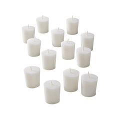 many white candles are arranged in a circle