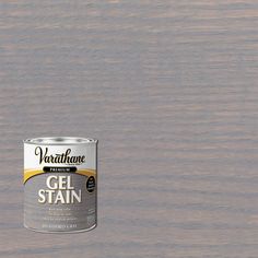 a can of vartaine gel stain sitting on top of a wooden floor next to a wall