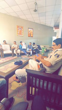 a group of people sitting in a waiting room