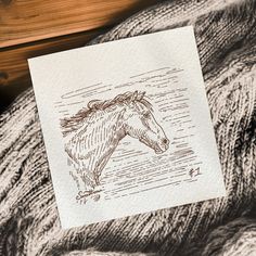 a piece of paper with a drawing of a horse on it