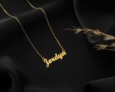 🌸 Get your unique and eye-catching 14K Solid Gold Name Necklace now. Available in different font styles and different styles of chains. Wearing a Name Jewelry is a great way to add a burst of uniqueness and personality. 🌸 You can customize this 14k solid gold name necklace with a name/word of your choice. All our personalized gold necklaces are suitable for all kinds of clothing and add a great sparkle to your wardrobe. Each personalized name necklace is made to order, which gives our pieces a unique meaning that is specific and special to you. 🌸 Chic elegance and minimalist aesthetics collide in this Dainty Name Necklace. The unique simplicity of this Name Jewelry complements any style, making it a timeless staple in every wardrobe. Personalize a Custom Name Necklace for yourself or as Customizable Gold Name Necklace For Christmas, Gold Name Necklace For Christmas Birthday Gift, Custom Name Gold Necklace For Christmas, Personalized Gold Name Necklace For Christmas, Gold Necklace With Name For Christmas, Customized Gold Necklace For Gifts, Gold Christmas Necklace With Name Detail, Customized Gold Jewelry For Christmas, Gold Nameplate Necklace For Christmas