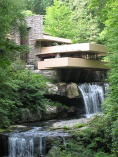 the falling waterfall house is surrounded by lush green trees and water cascadings