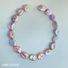 One picture corresponds to one product.  1 Strand 15.5 inches（39.4cm) Button Baroque pearl necklace Pearl size:  16.5mm-19mm（W)      20.5mm-23mm（L)     6-9.5（THK） Pearl color: Natural Purple Rainbow，strong natural metallic. Holes:  go though The luster and shape of this batch of purple rainbow button baroque pearl necklaces are very pretty. I hope to provide high-quality services for your pearl jewelry design. Baroque Pearls Necklace, Purple Rainbow, Pearl Jewelry Design, Baroque Pearl Necklace, Pearls Necklace, Unique Jewelry Designs, Pearl Color, Pearl Size, Schmuck Design