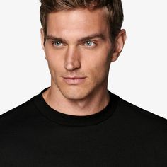 Tailored to a relaxed fit with room for movement, this sleek black short-sleeve t-shirt features a classic crewneck collar. Modern Black Crew Neck T-shirt, Modern Black Short Sleeve Tops, Crew Neck T-shirt With Ribbed Neckline For Streetwear, Streetwear T-shirt With Ribbed Crew Neck, Modern Black T-shirt For Everyday, Modern Black Everyday T-shirt, Classic Relaxed Fit Shirt With Crew Neck, Classic Crew Neck Shirt With Relaxed Fit, Modern Crew Neck T-shirt For Everyday