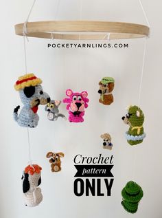 crochet mobile with animals hanging from it's sides and the words crochet pattern only above them