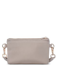 The Skye sling bag is our much-anticipated crossbody that holds everything you need while you're on the go! It has a built-in wallet with three card slots, two open pockets for extra cards or gum, and a cash slot to stash your bills. On the front, you'll find a zippered pocket where you can store receipts, spare change, or other small items, and a pocket with a magnetic snap closure on the back perfect for keeping your phone safe & sound. Snap on the adjustable nylon strap with gold leaf accents Versatile Crossbody Bag With Interior Card Slots, Versatile Crossbody Shoulder Bag With Interior Card Slots, Store Receipts, Spare Change, Backpacking Packing, Silver Leaf, Functional Design, Small Items, Sling Bag