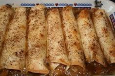 some food that is on top of a plate and in the middle of an article about apple enchiladas