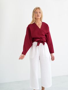 "JUNE is a long sleeve linen wrap top. DETAILS - True wrap closure - Long sleeves - 100% lightweight European linen fabric - Cut and sewn to order just for you in our studio COLOR - Cherry Red, you can also choose other colors above - Fabric samples are available here https://www.etsy.com/listing/586569696/linen-fabric-samples SIZING & FIT - Relaxed, loose fit - Length is approximately 20 inches / 51 cm - Bust is approximately 21 inches / 51 cm - Measurements taken from a size S - Model is 5 Spring Wrap Top With Tie Waist And Long Sleeves, Spring Long Sleeve Wrap Top With Tie Waist, Long Sleeve Wrap Top With Tie Waist For Spring, Spring Cotton Long Sleeve Wrap Top, Spring Long Sleeve Cotton Wrap Top, Long Sleeve Wrap Top For Summer Workwear, Summer Long Sleeve Wrap Top For Work, Versatile Long Sleeve Wrap Top For Spring, Cotton Long Sleeve Wrap Top For Summer