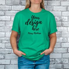 1x Kelly Green Gildan 64000 Mockups - This digital download includes a professional, high resolution image of a Kelly Green Gildan T-shirt on a female model with a brick background. 3000 x 3000px They can be used to showcase your products or create unique digital imagery for your social media channels. Once downloaded, layer your artwork on top and create stunning images to save you valuable time having to set up yourself! BUNDLES  This mockup is also available in the following bundles; ALL 61 G Customizable Green Crew Neck T-shirt, Customizable Green Cotton Shirt, Customizable Green Short Sleeve T-shirt, Customizable Green Short Sleeve Tops, Gildan Tshirt, Brick Background, Hoodie Mockup, Gold Shirt, Green Sweatshirt