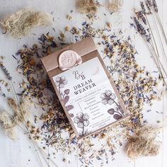 a package of dried flowers sitting on top of a table