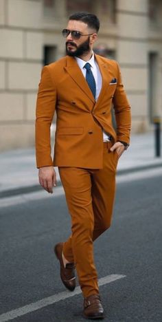 This unique wedding burnt-orange suit is designed with high quality wool material that guarantees durability and comfort. It is suitable for all kinds of occasion and it can be worn all year round. It comes in 2 pieces ( Breasted Jacket + pant) the blazer can also be worn with any kind of trouser or jeans  For custom orders, Please feel free to start a  conversation for further enquires. Your satisfaction is our priority Orange Formal Suit For Fall, Tailored Orange Blazer With Notch Lapel, Fitted Orange Suits For Fall, Orange Tailored Suit With Notch Lapel, Tailored Orange Blazer For Business, Formal Orange Blazer For Fall, Tailored Orange Office Blazer, Elegant Orange Notch Lapel Suits, Brown Double Breasted Suit For Business