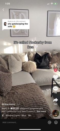 a living room filled with lots of furniture and pillows