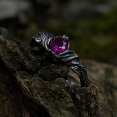 Crafted from sterling silver, our Ethereal Fairy Witchy Wedding Band is a unique and enchanting piece that seamlessly blends fantasy and nature. With intricate details inspired by the magic of a woodland elven realm, this ethereal jewelry captures the essence of a fairy witchy wedding. Ideal for those seeking a unique nature-inspired gift or a dark fairy ring for men, this silver braided ring with twig leaves is a distinctive accessory that adds a touch of enchantment to any occasion.  Characteristics: Metal - Recycled solid sterling silver  Stone - Cubic Zirconia 5.0 mm Finish - Oxidized. View all silver fairy rings: https://www.etsy.com/shop/TinyShinyJewel?ref=seller-platform-mcnav&section_id=4432099 Care instructions: To care for the ring, avoid contact with water and chemicals such as Magical Silver Crystal Promise Ring, Silver Magical Crystal Promise Ring, Sterling Silver Magical Promise Ring, Magical Sterling Silver Rings For Anniversary, Ethereal Sterling Silver Promise Ring, Spiritual Sapphire Wedding Ring As Birthstone, Spiritual Sapphire Wedding Ring With Birthstone, Mystical Handmade Crystal Wedding Ring, Sterling Silver Fantasy Ring