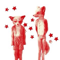 an image of two foxes in pajamas standing next to each other with red stars on them