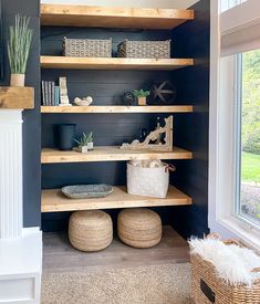 the shelves in this room have baskets on them