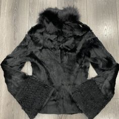 Fur Coat Solleciti Size 40 It In High Quality Black Fur Short Jacket With Glossy Effect. Detachable Silver Fox Fur Collar. With Pockets. Silk Lining. Bell Sleeves. . Front Closure With Hooks.Its Say Size 6 Us But Run Small More Like Size 2 Measurement Shoulder To Shoulder 16" Armpit To Armpit 18" Length Of The Jacket (Back) 21.5" Sleeves From Arm 25" Teddy Jacket, Silver Fox, Short Jacket, Fur Collar, Fur Collars, Fox Fur, Bell Sleeves, Fur Coat, Winter Jackets