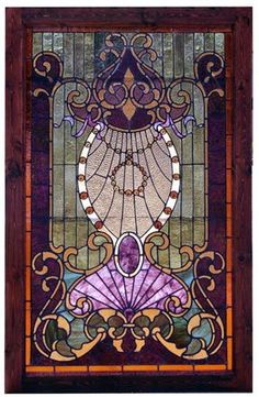 a stained glass window with an ornate design