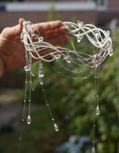 a person is holding some kind of wire