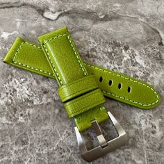 Introducing our new range of vintage leather straps made for Panerai watches. If you are looking to replace an old strap on your Panerai Luminor, Radiomir or just fancy a change, you'll find our handmade leather straps are the perfect fit! Expertly handmade in Italy from lightly aged leather, all straps include a high grade stainless steel, Pre Vendome screw-in buckle, and complementary Pre Installed tubes.      Genuine Leather     Length: 12cm x 7.5cm     Width : 24 mm     Buckle: 22mm     Handmade in Italy  Need Help? Send us a message for expert advice.  We ship worldwide. Classic Green Watch Accessories For Everyday Use, Green Leather Watch Bands For Everyday Use, Classic Green Leather Watch Band, Classic Green Leather Watch Accessories, Green Leather Watch Bands With Bracelet Strap, Panerai Watches, Panerai Luminor, Leather Watch Strap, Leather Shops