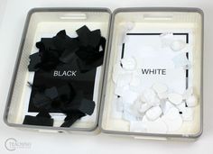 two boxes with black and white items in them