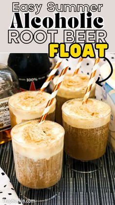 three glasses filled with root beer floater on top of a table