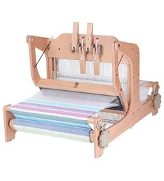 an old weaving machine with two looms on it