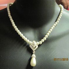 This is a Vintage GORGEOUS NAPIER White 'Pearl' & Art Deco Silver/Crystal Teardrop Focal Beaded Necklace This is a 70's/80's, signed NAPIER, in BEAUTIFUL STUNNING condition. This is a white 'pearl' beaded strand with a STUNNING art deco silver & crystal focal with pearl teardrop...measures 15 1/2" - 18" has extender & shepherds style hook,  GORGEOUS/STUNNING ALL BRIGHT CRYSTALS NO MISSING...has an EDWARDIAN styling I find no MAJOR/minor pitting, patina, or scratches that break surface of plating/high shine or major tarnishing,. REMEMBER, this is a vintage,preowned/used item...some wear is to be expected...all MAJOR wear is always noted.Clean vintage earrings before wearing. If you have ?'s & or concerns ask PRIOR to purchase.  I AM in no way an EXPERT at what is or isn't vintage, all I can Pearl Art, Art Deco Silver, Scented Sachets, Edwardian Fashion, Silver Crystal, Remember This, White Pearl, Vintage Earrings, Evening Wear