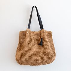 NOW AVAILABLE IN STOCK. FAST SHIPPING FROM LOS ANGELES. 3-5 DAYS Large straw woven tote bag with leather straps and tassel perfect for all occasions. A classic look with the durability and convenience of leather straps, perfect for wherever your day takes you. Size: 15"H x 17"W Designer Style ID: 8472 Large Straw Woven Tote Bag with Leather Straps, Summer Bag, Everyday Shoulder Bag, Beach Bag Brown Tasseled Beach Bag For Travel, Brown Tassel Beach Bag For Travel, Everyday Brown Woven Leather Beach Bag, Casual Brown Beach Bag With Tassels, Brown Tassel Shoulder Bag For Vacation, Everyday Brown Shoulder Bag With Tassels, Brown Tassel Shoulder Bag For Everyday, Casual Brown Shoulder Bag With Tassels, Brown Beach Bag With Tassels For Everyday Use