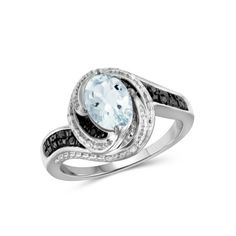 1.15 Carat T.G.W. Aquamarine Gemstone Ring can add a touch of dramatic flair to almost any outfit. It features contrasting stark black and white diamonds with a soft blue-green semi-precious stone. This ring is a stand-out piece that jewelry lovers can enjoy. Aqua is most commonly associated with spring and hope and adds a delightful gleam to jewelry. Admire this delicate hue as you adorn yourself with this 1/10 carat black and white diamond ring. Wear it to simply brighten your weekday. Add the Oval Multi-stone Diamond White Rings, Diamond White Multi-stone Promise Ring, White Rings With Accent Stones In Fine Jewelry Style, Fine Jewelry White Rings With Gemstone Accents, White Diamond Ring, Ring Birthstone, Sterling Silver Rings Bands, Aquamarine Jewelry, Aquamarine Ring