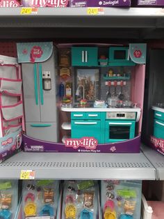 the toy kitchen is on display for kids to play in it's own store