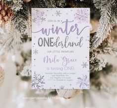 a white and purple winter onederland birthday party