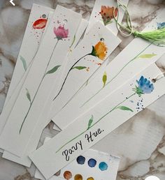 six watercolor cards with flowers on them