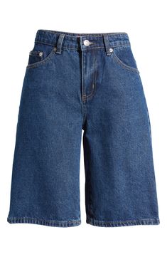 An oversized silhouette and low rise amplify the trend-savvy appeal of denim Bermuda shorts rendered in a classic blue wash. 100% cotton Machine wash, dry flat Imported Long Jorts Women, Bermuda Aesthetic, Long Shorts Outfits Women, Long Jean Shorts Outfit, Baggy Shorts Women, Jean Shorts Long, Jorts Women, Denim Long Shorts, Football Casual Clothing