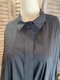 NOEN SHIRT - 121-86003-8235-0-10 Product group Name Q.NEEL Item Type Name Shirt Fit A-shape Color Available in White and Black solids Composition 65% Cotton / 30% Polyamide / 5% Elastane Elegant Black Blouse With Shirttail Hem, Classic Black Shirttail Hem Top, Black Fitted Tops With Shirttail Hem, Fitted Black Top With Shirttail Hem, Collared Black Shirt For Night Out, Black Collared Shirt For Night Out, Black Relaxed Fit Shirt For Office, Black Collared Tops For Work, Black Relaxed Fit Office Shirt